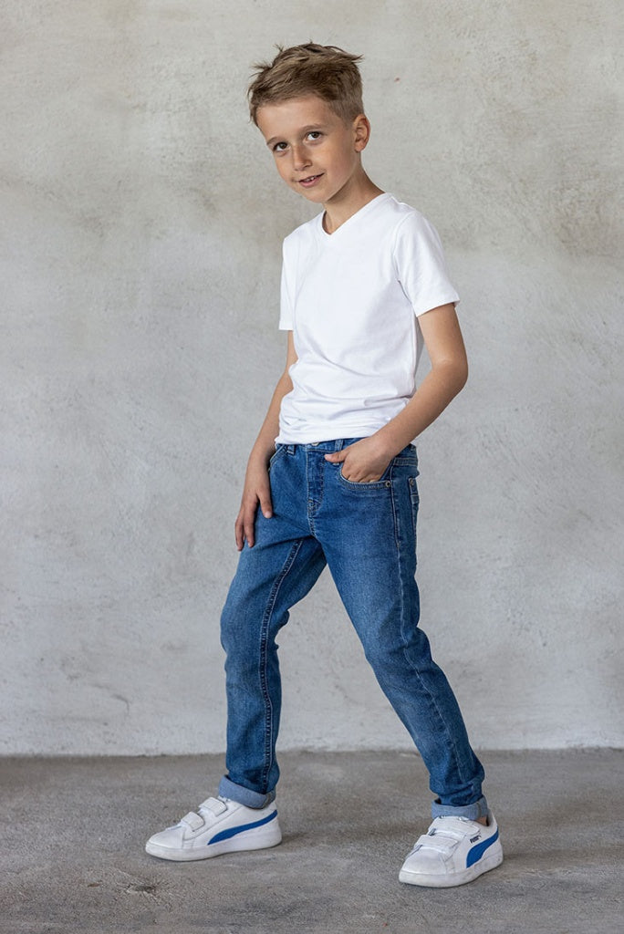 Boy wearing the skinny jeans in medium used wash by TYGO & vito | Front View