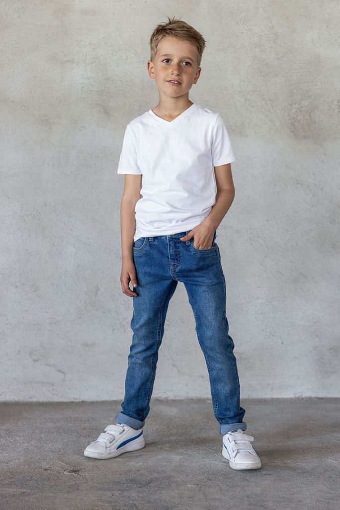 Front view of the boy wearing the skinny jeans in medium used by TYGO & vito