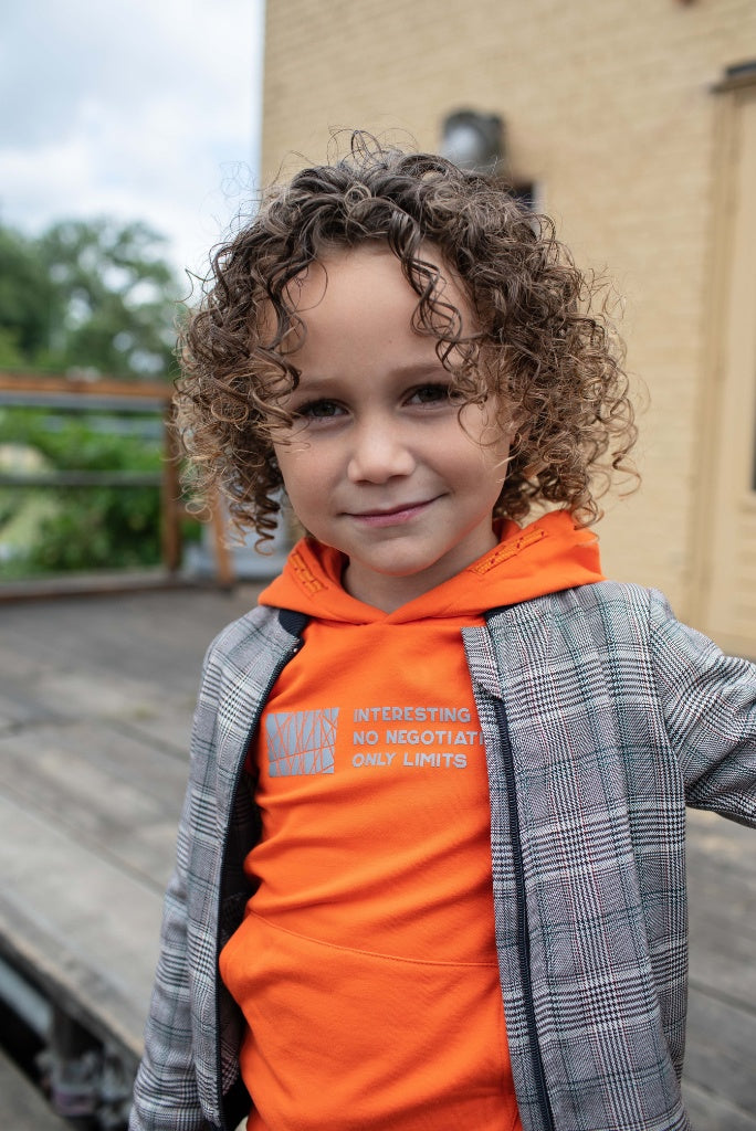 Close view of the boy wearing the Bomber Jacket Kobe by Quapi