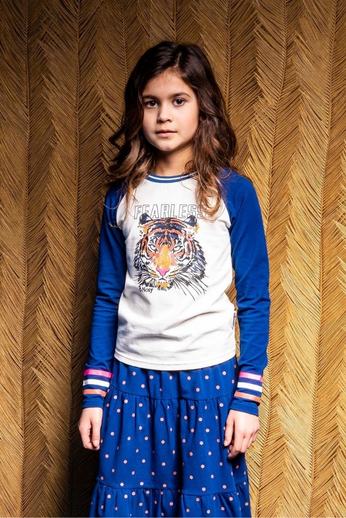 Close view of the girl wearing the raglan long sleeve top by B.Nosy