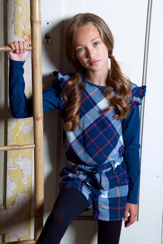 Girl wearing the blue check shorts by B.Nosy