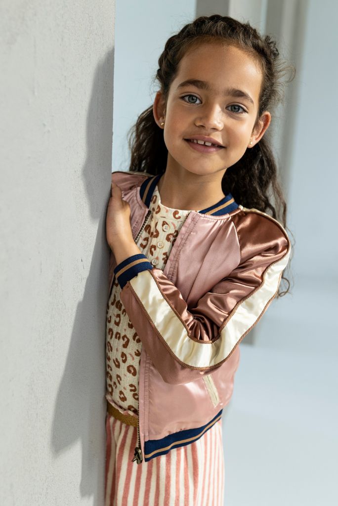 Close view of the girl wearing the leopard combi dress by Like FLO