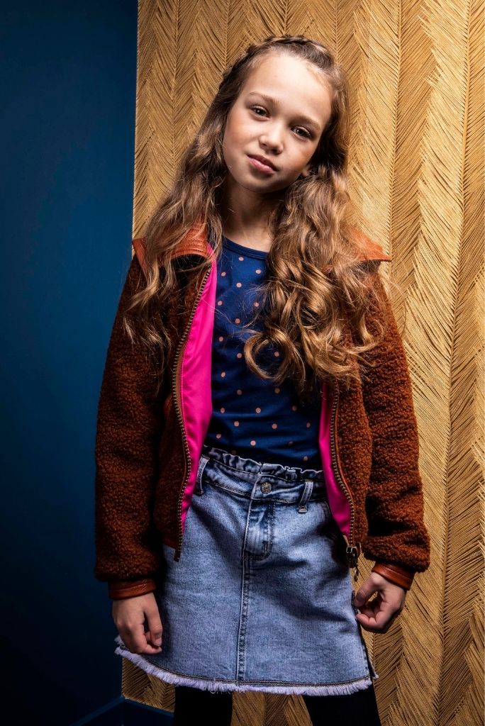 Close view of the girl wearing the sherpa jacket by B.Nosy