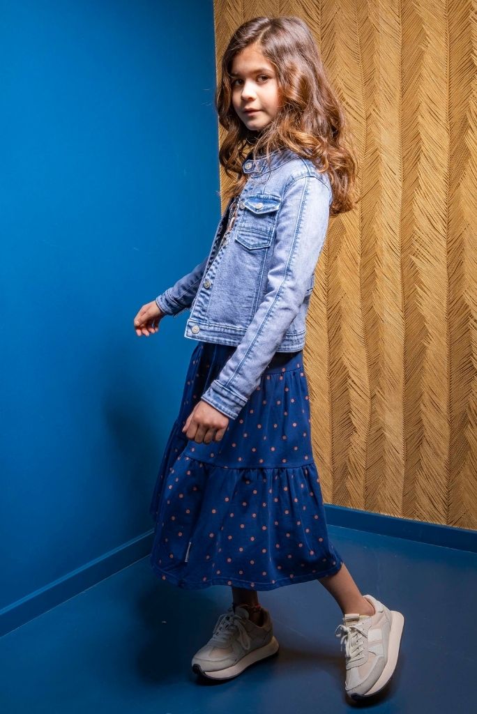 Girl wearing the denim jacket with the maxi skirt by B.Nosy