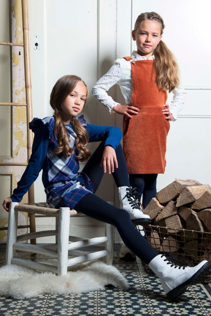 Two girls posing in the blue check shorts by B.Nosy