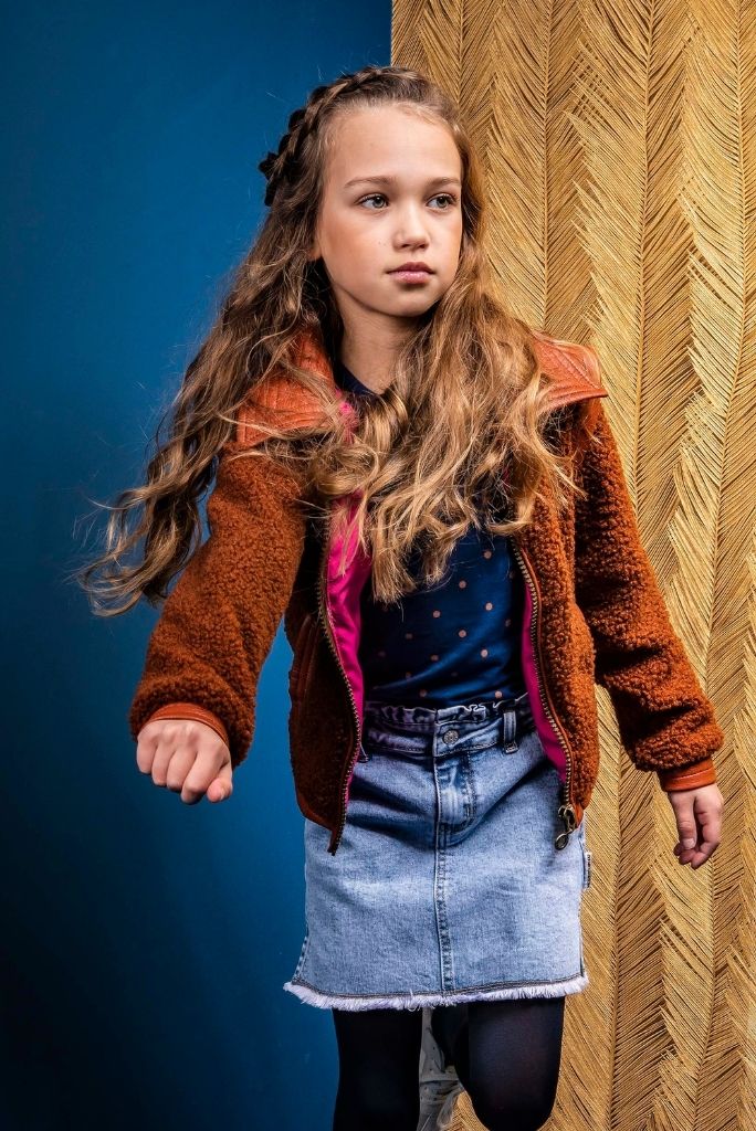 Girl dancing and wearing the sherpa jacket by B.Nosy