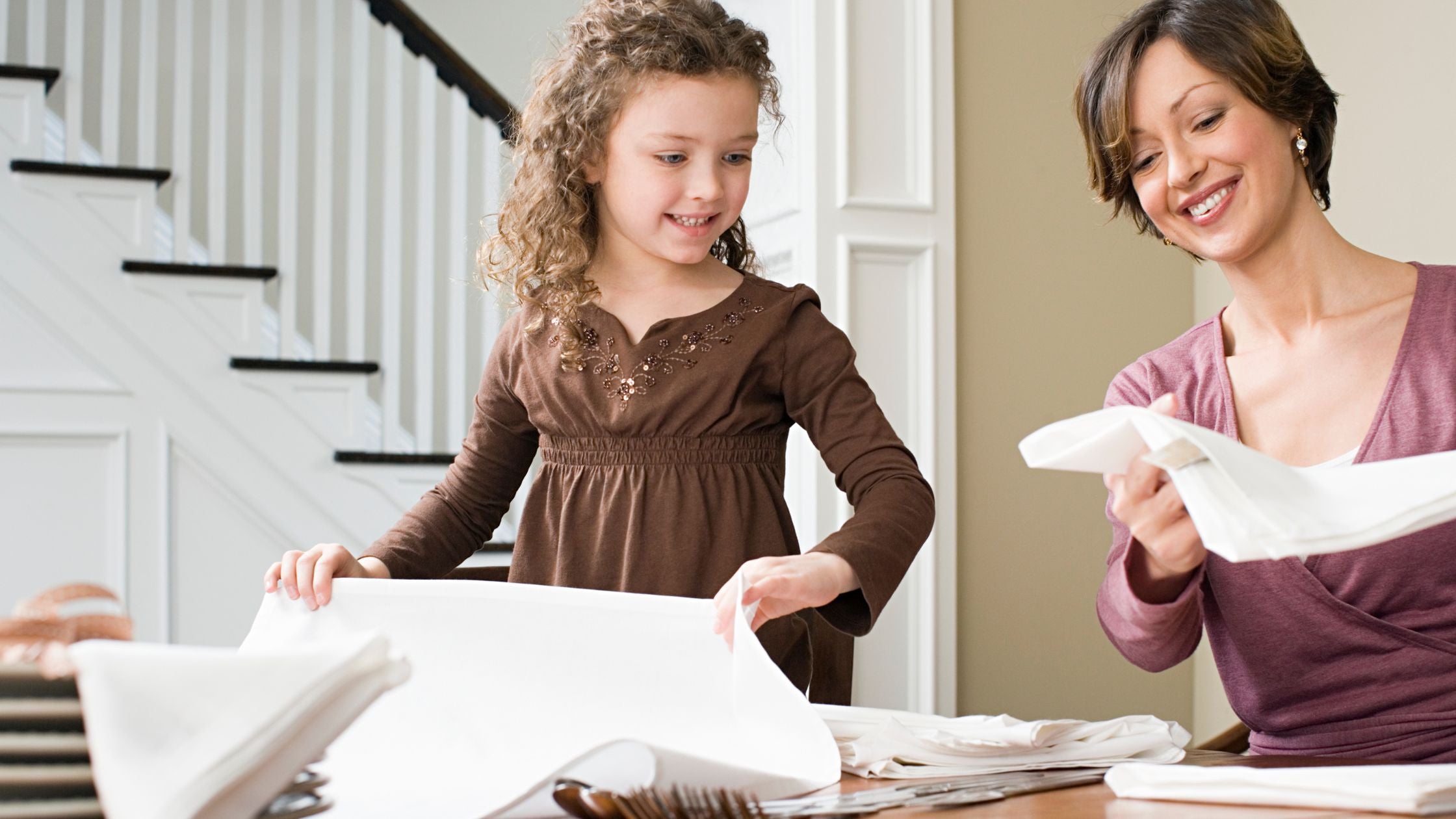 Mother folding sustainable kidswear made from soft cotton