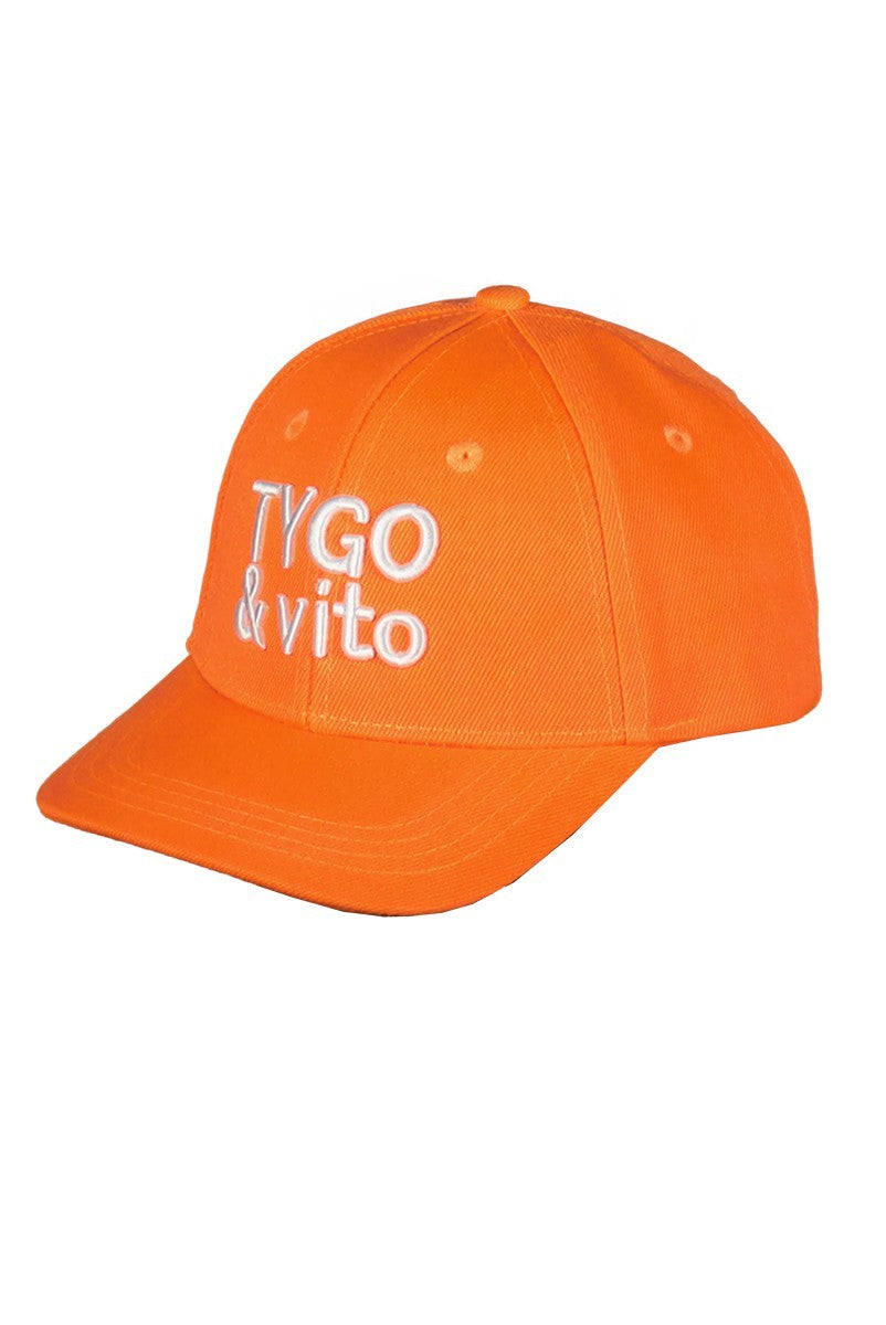 Boys orange cap with 'TYGO & vito' text on a white background
