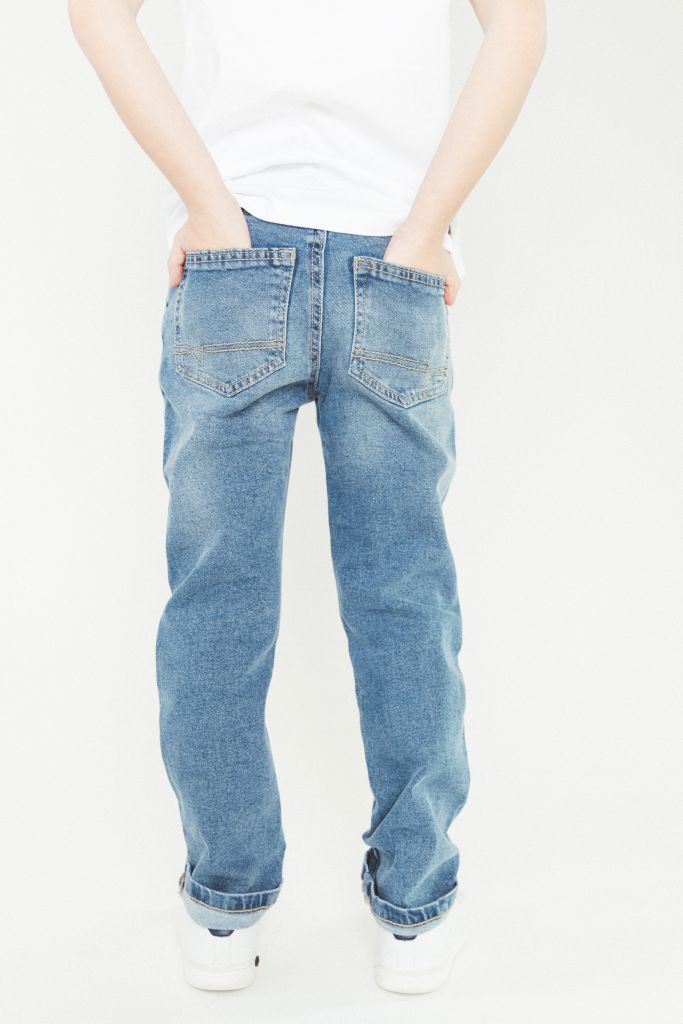 Back view of the boy wearing the Bozz Jeans
