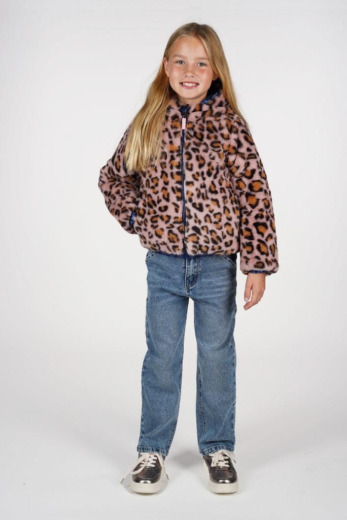 Girl wearing a leopard print jacket and blue jeans on a white background