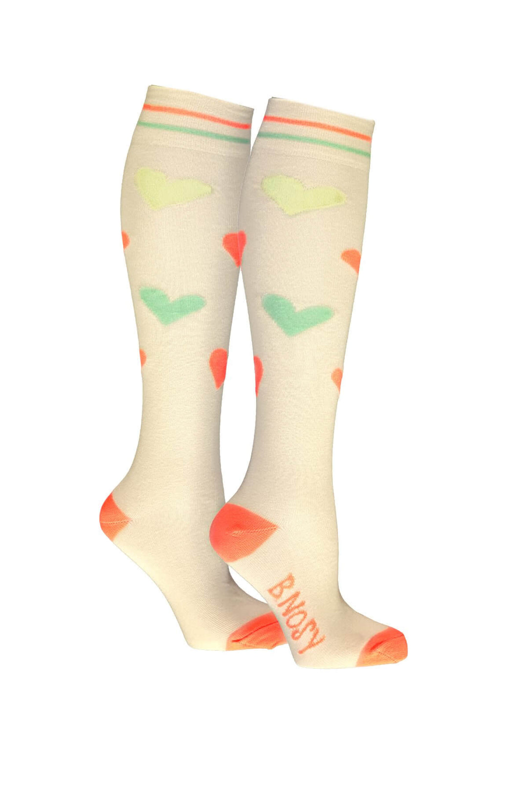 A pair of knee-high socks in a warm cream color, decorated with light green and orange hearts, striped cuffs, and the word &