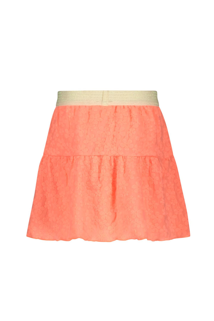 Back view of a neon orange tiered skirt with a textured fabric and a contrasting beige waistband, shown against a plain white background.